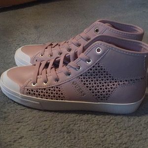 Blush pink guess high top sneakers.